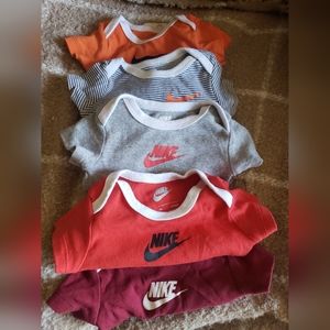 Nike 5 piece infant bodysuits in multiple colors